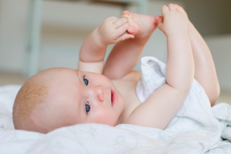 baby-girl-lying-on-back-2024-10-22-04-45-28-utc-min